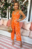 Blood Orange Animal Print V Neck Jumpsuit