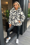 Cream And Black Swirl Pattern Front Pocket Teddy Hoodie